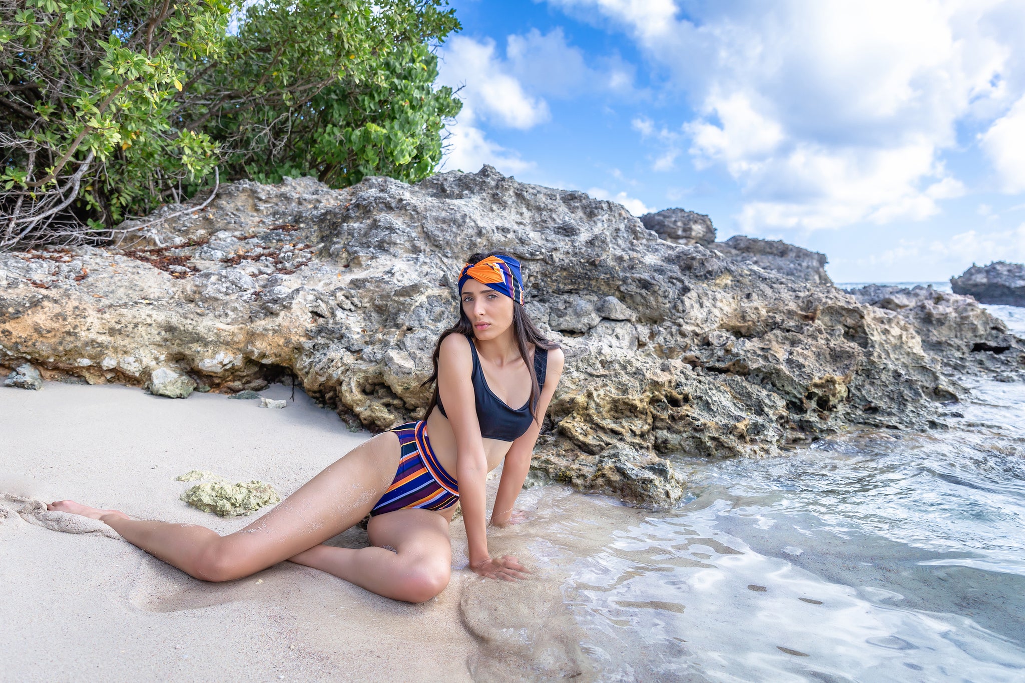 Black sporty top and high waist striped bikini